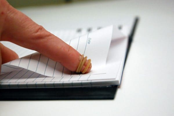 Use a rubber band to help you turn stubborn pages