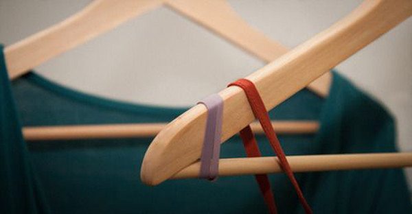 attach rubber bands to hanger ends