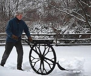 wheeled snow shovel