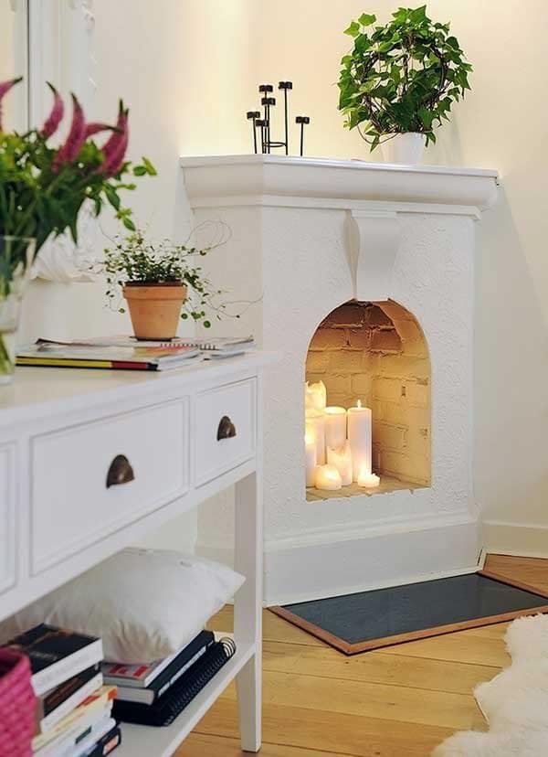 candles-in-fireplace