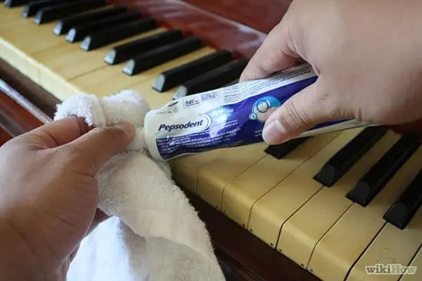 clean-piano-keys-toothpaste