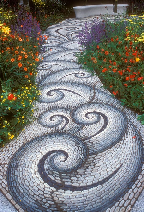 garden-pebble-path-waves-flowers