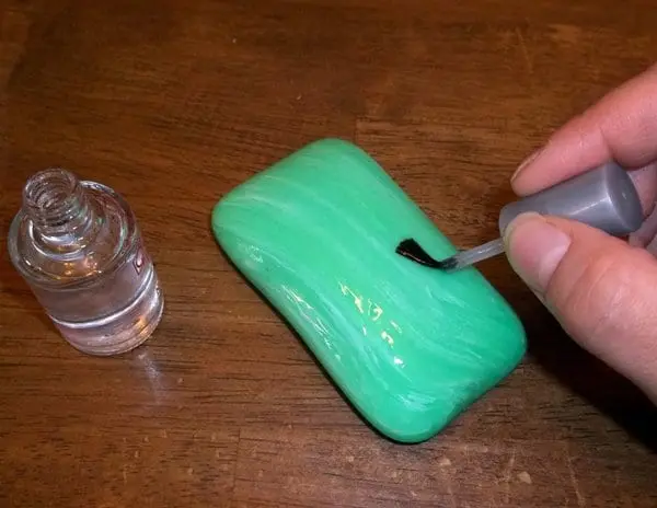 soap covered in clear nail varnish 