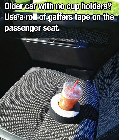 roll of gaffers tape holds drinks in old car