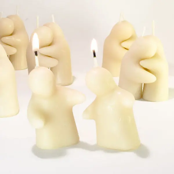 burning love hug candles