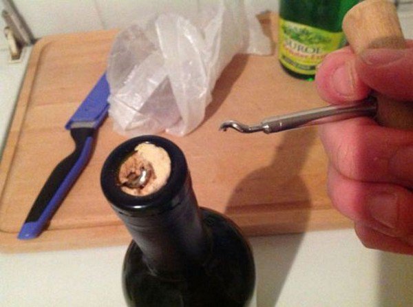 corkscrew broken wine bottle