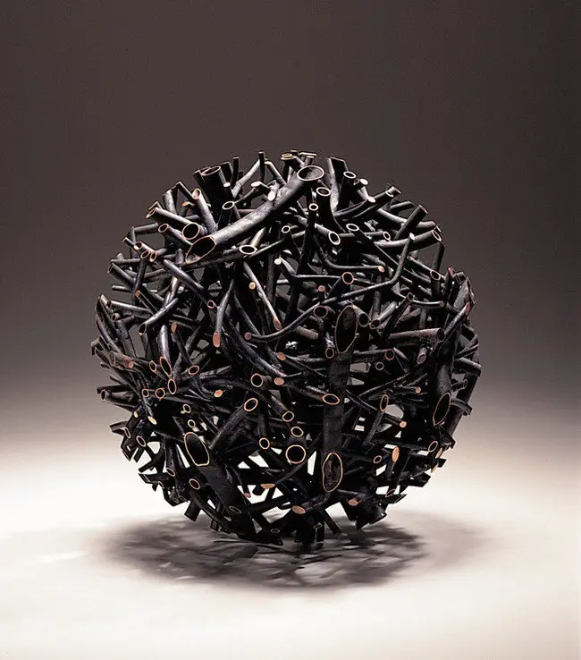 dark circular wooden ball