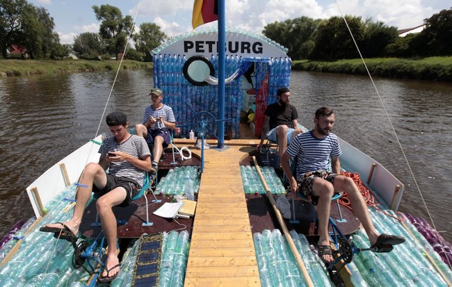 men relaxing boat