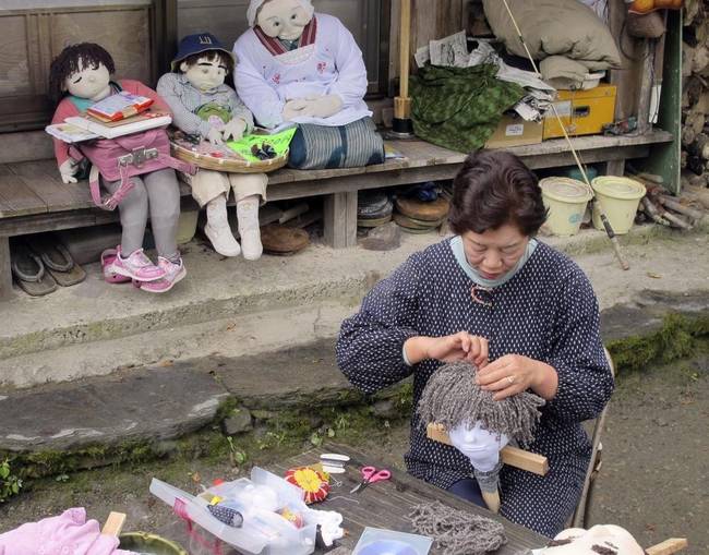 woman making scarecrow