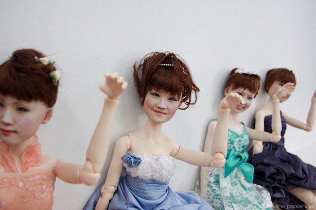 clone dolls in row