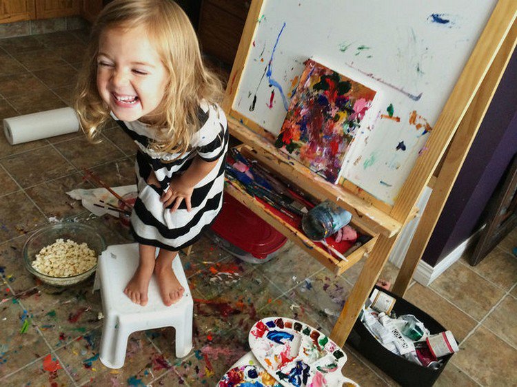 girl laughing painting