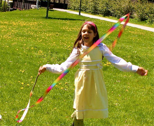 girl twirling ribbons