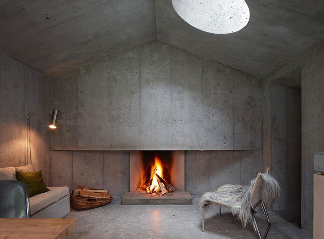 inside-concrete-log-cabin-fire