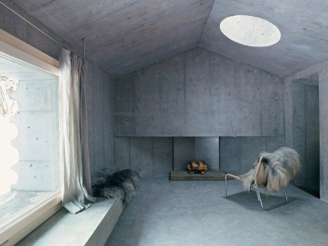 inside-concrete-log-cabin-seat