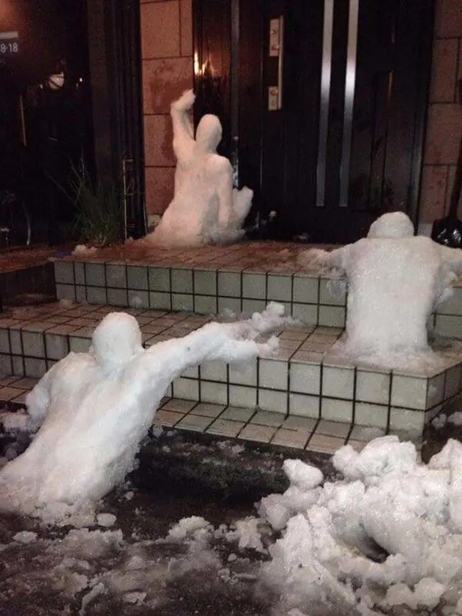 snowmen coming out of ground
