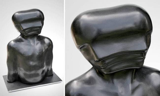 black head rocking torso sculpture