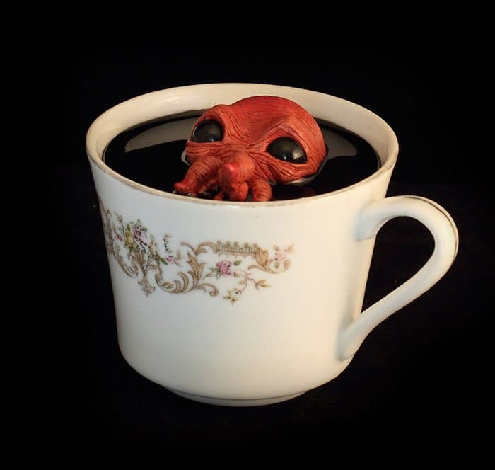 brown floating creature cup