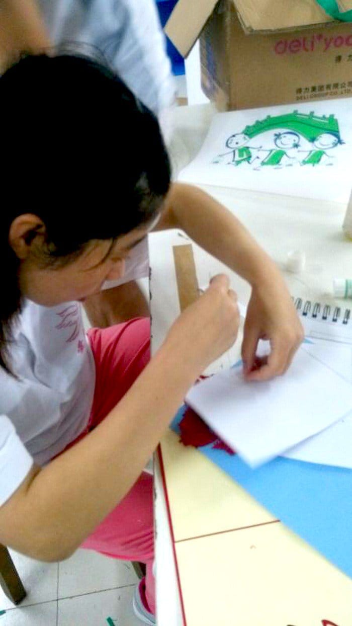 girl working with paper