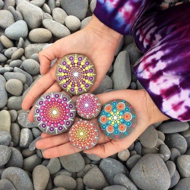 hands mandala stones