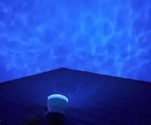 ocean wave light projector speaker blue