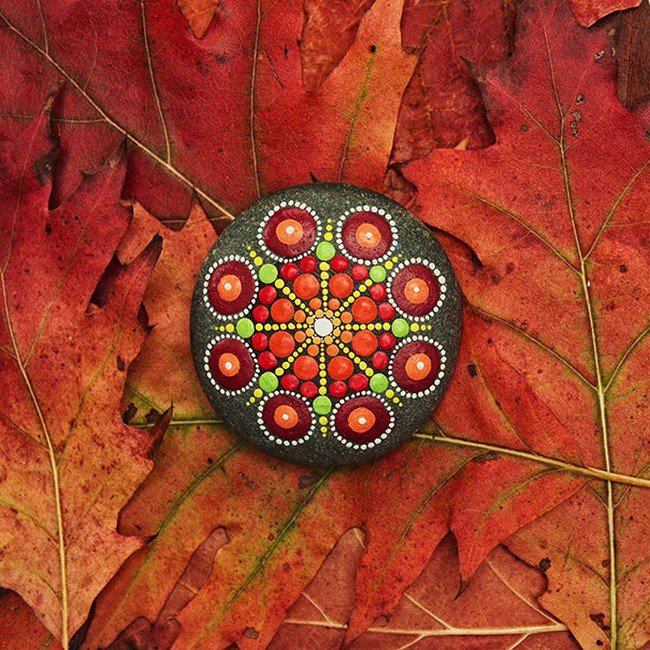 orange leaves mandala stone