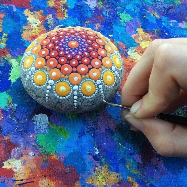 painting orange yellow mandala stone