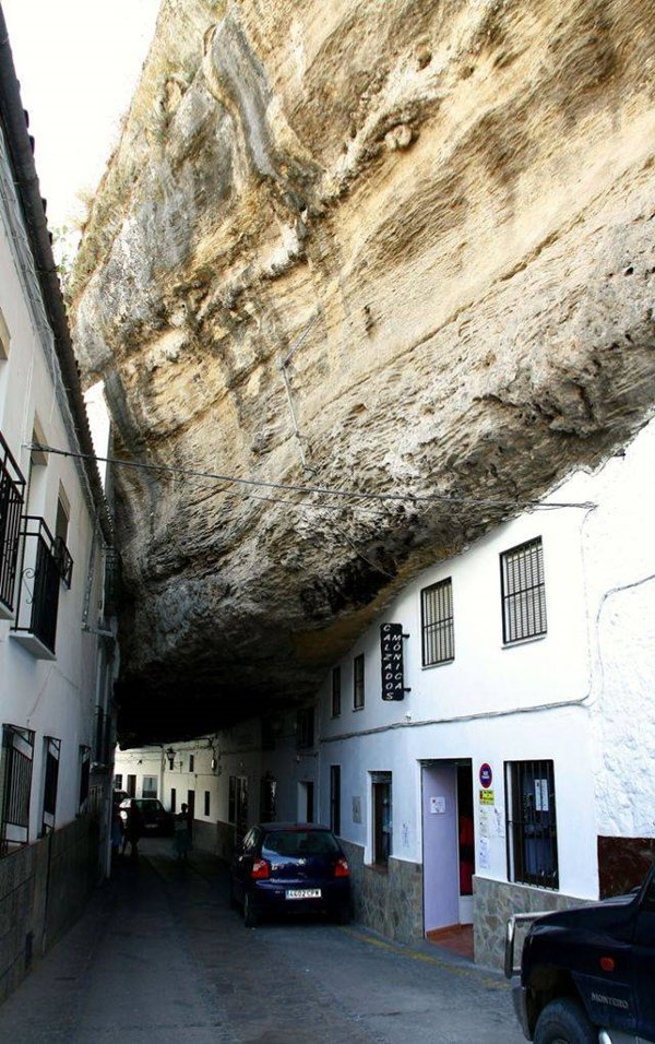 spanish-town-under-rock-cover