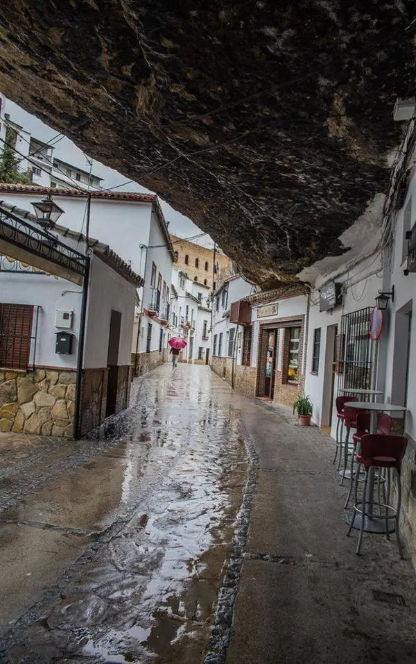 spanish-town-under-rock-rain