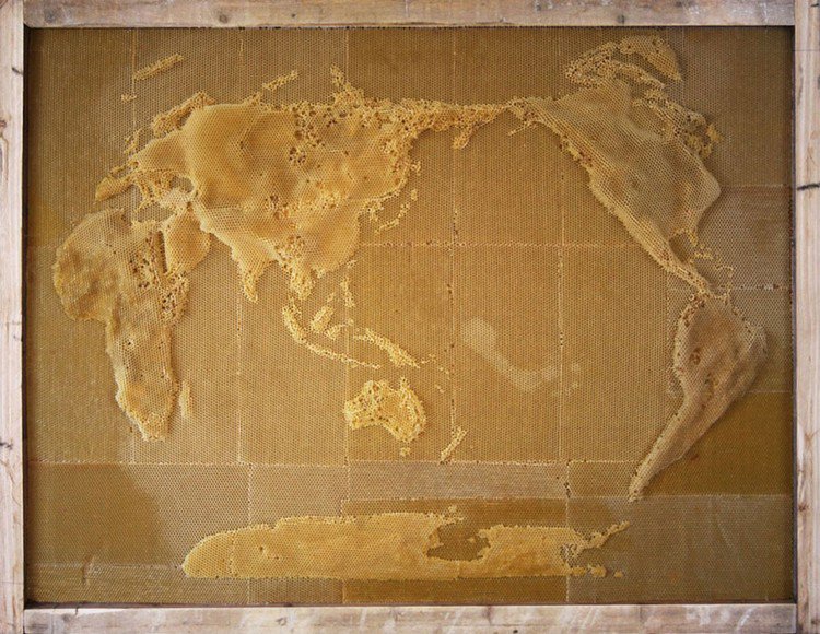 world map bee sculpture