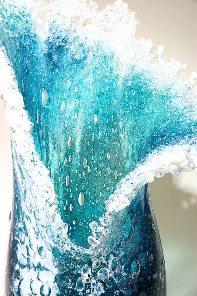 close up bubbles ocean wave vase