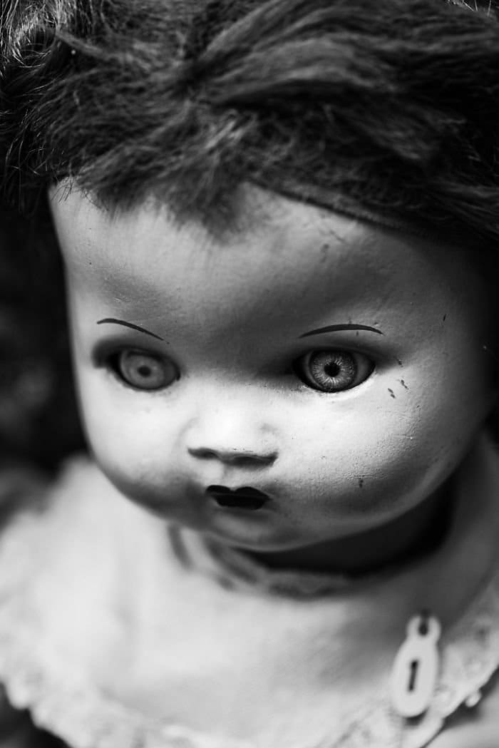 close up staring doll