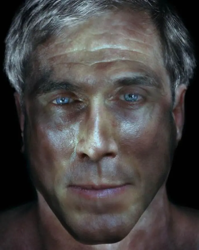 grey haired blue eyed man illuminated