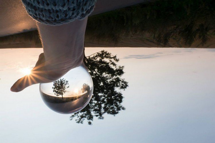 hand upside down landscape crystal ball