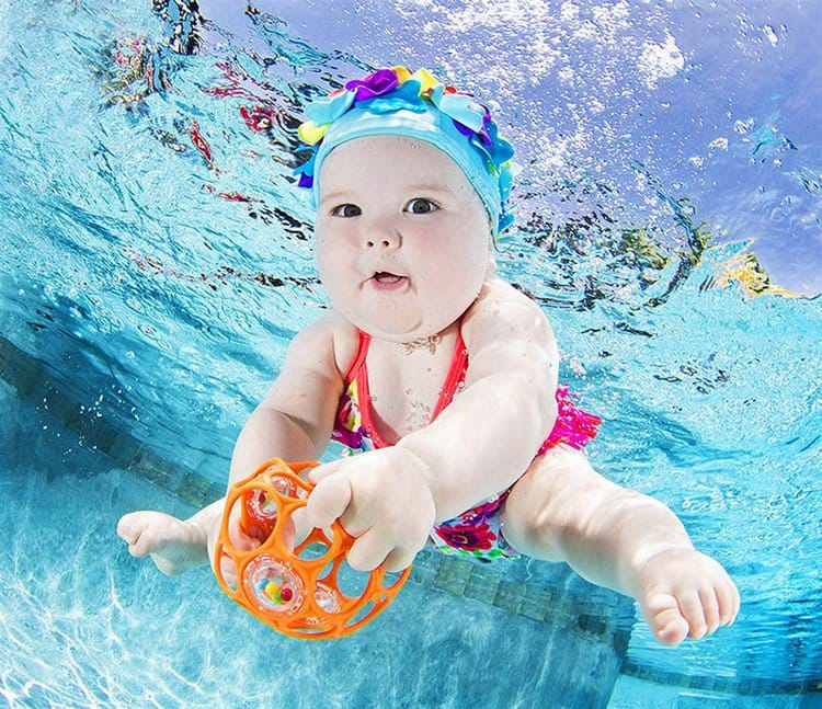 orange ball underwater babies seth casteel