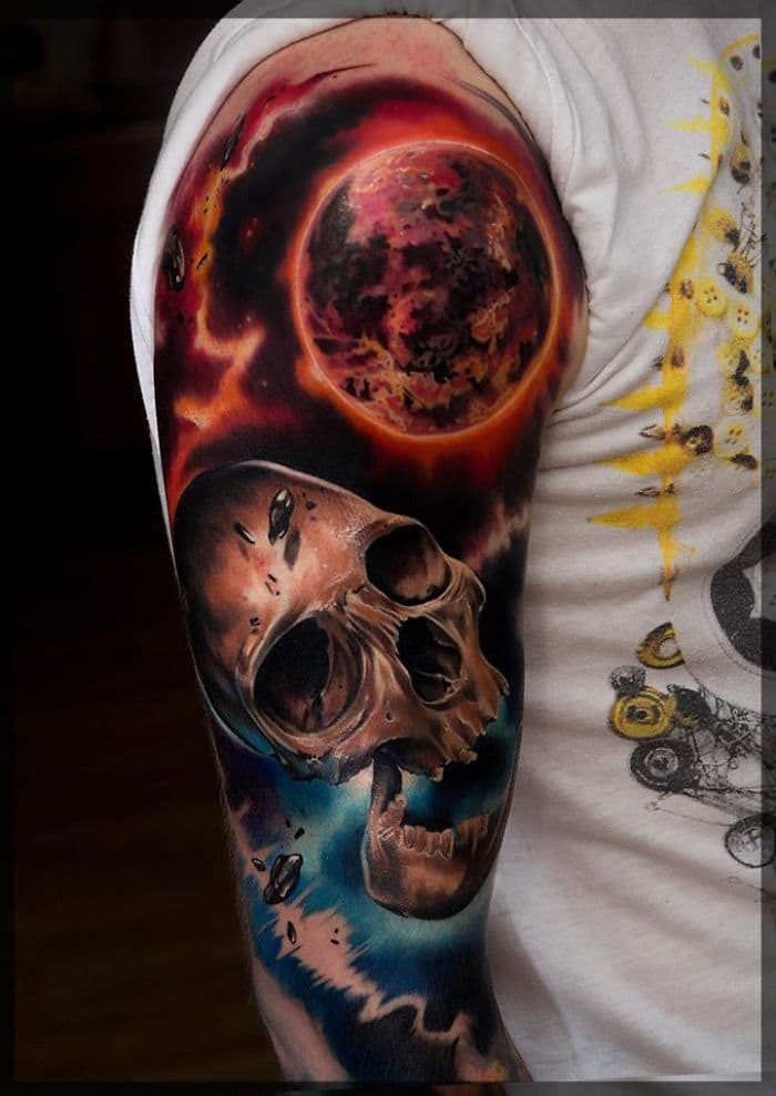 skull planet tattoo