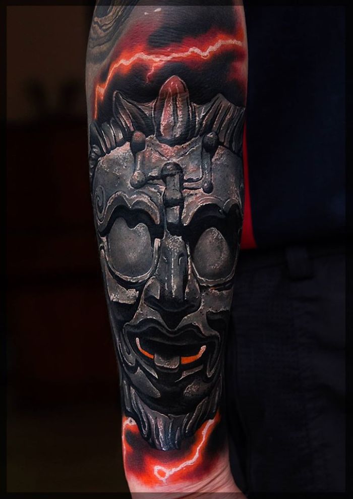 stone face tattoo