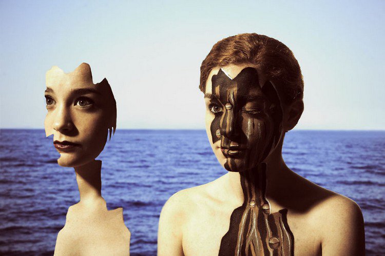 surreal  woman two faces sea