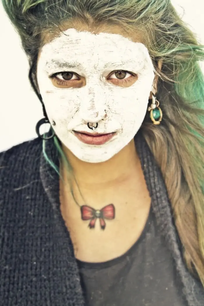 pierced tattooed woman white face