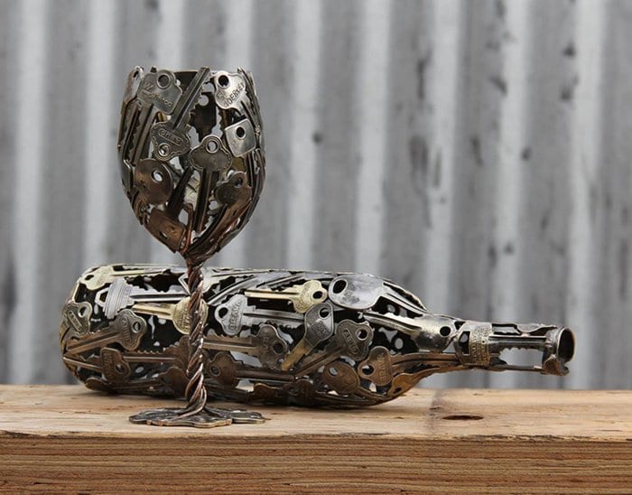 recycled-metal-sculptures-michael-moerkey-bottle-glass