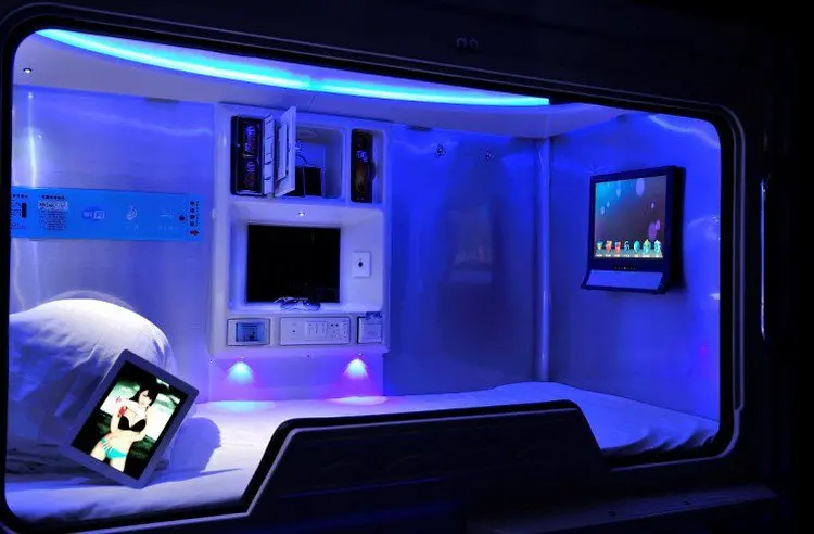 space hotel blue bed