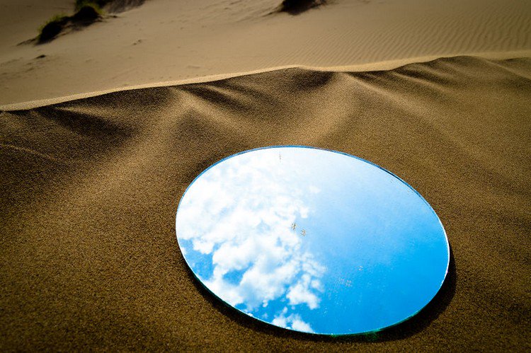 circular mirror desert