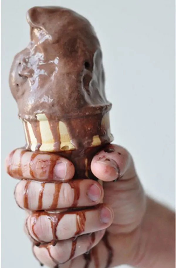 melting ice cream hand