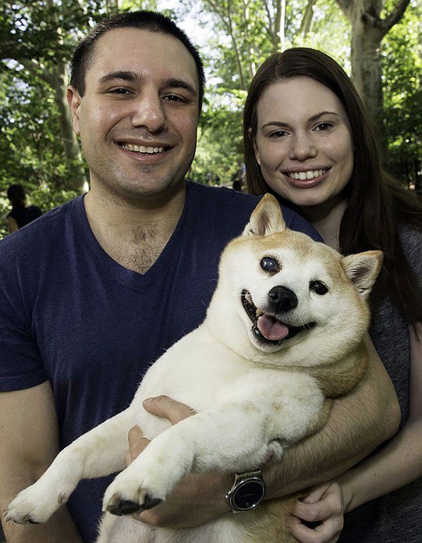 smiling couple dog