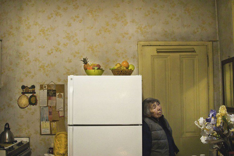 woman against fridge freezer