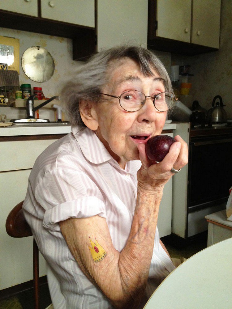 woman tattoo fruit