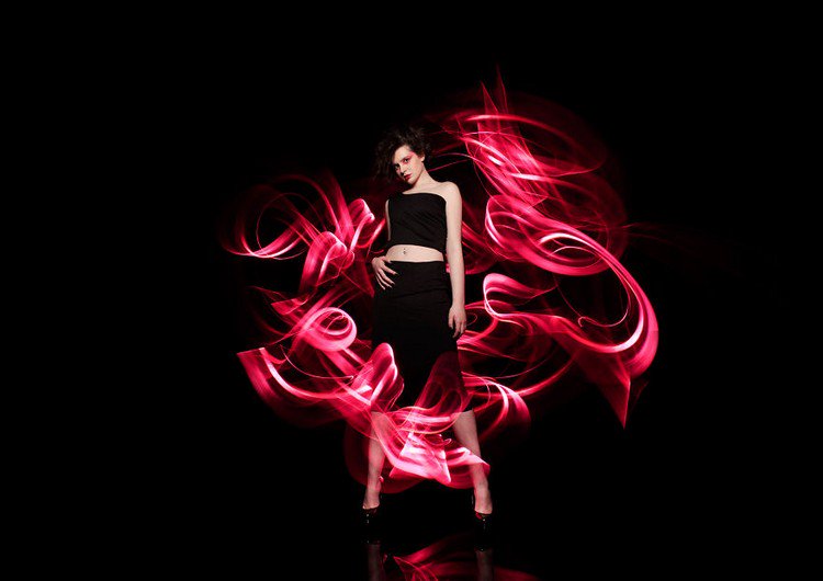 dark hair woman red swirl