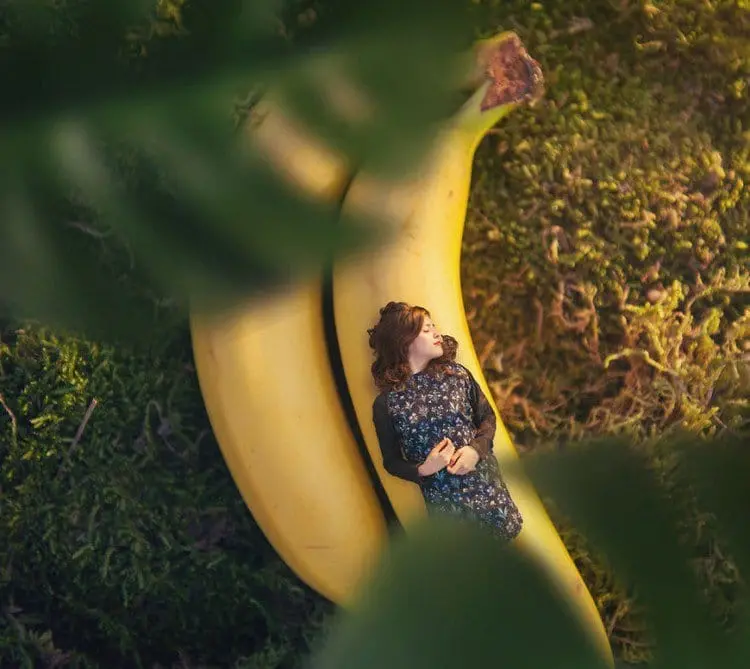 girl sleeping banana