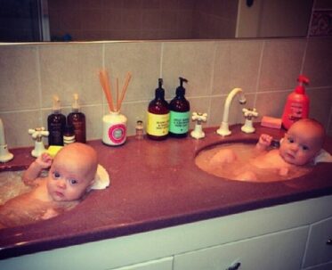 This Aussie Mom's Hilarious 'FAQ' Signs For Her Twin Girls Went Viral