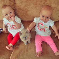 This Aussie Mom's Hilarious 'FAQ' Signs For Her Twin Girls Went Viral