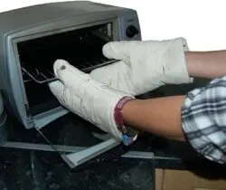 bandaged hands oven gloves